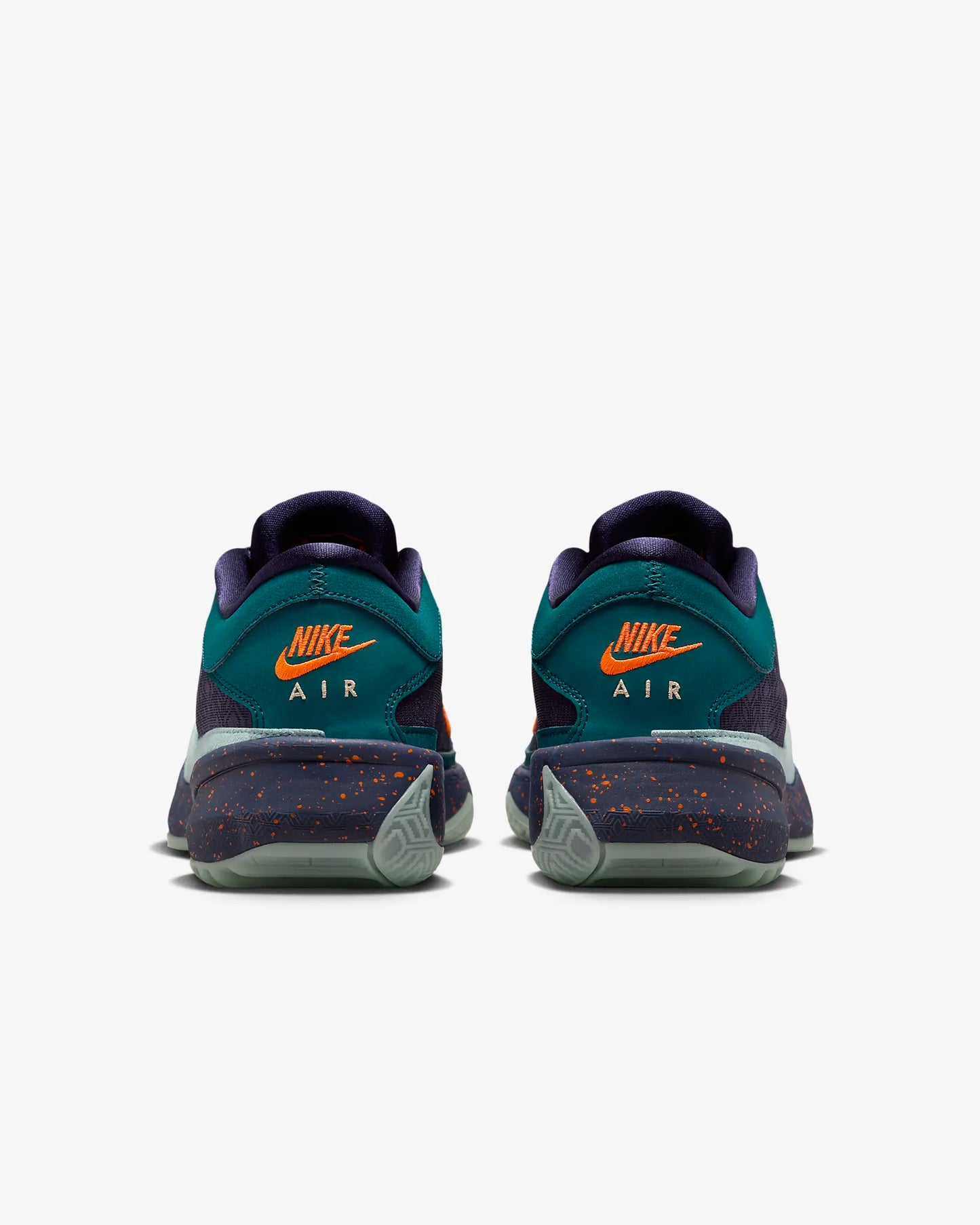 Giannis Freak 5 Basketball Shoes in Geode Teal and Purple Ink with Zoom Air cushioning and advanced traction.