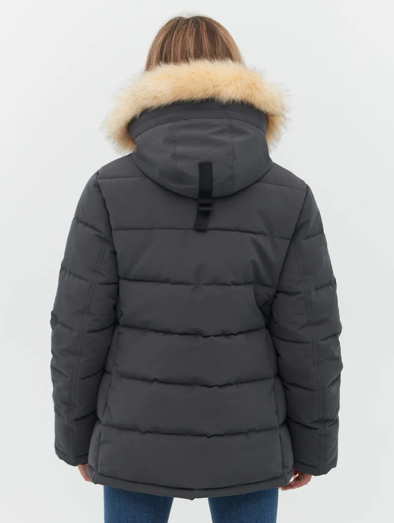 Back view of the sustainable jacket made from recycled polyester, showcasing faux fur trim and ribbed cuffs