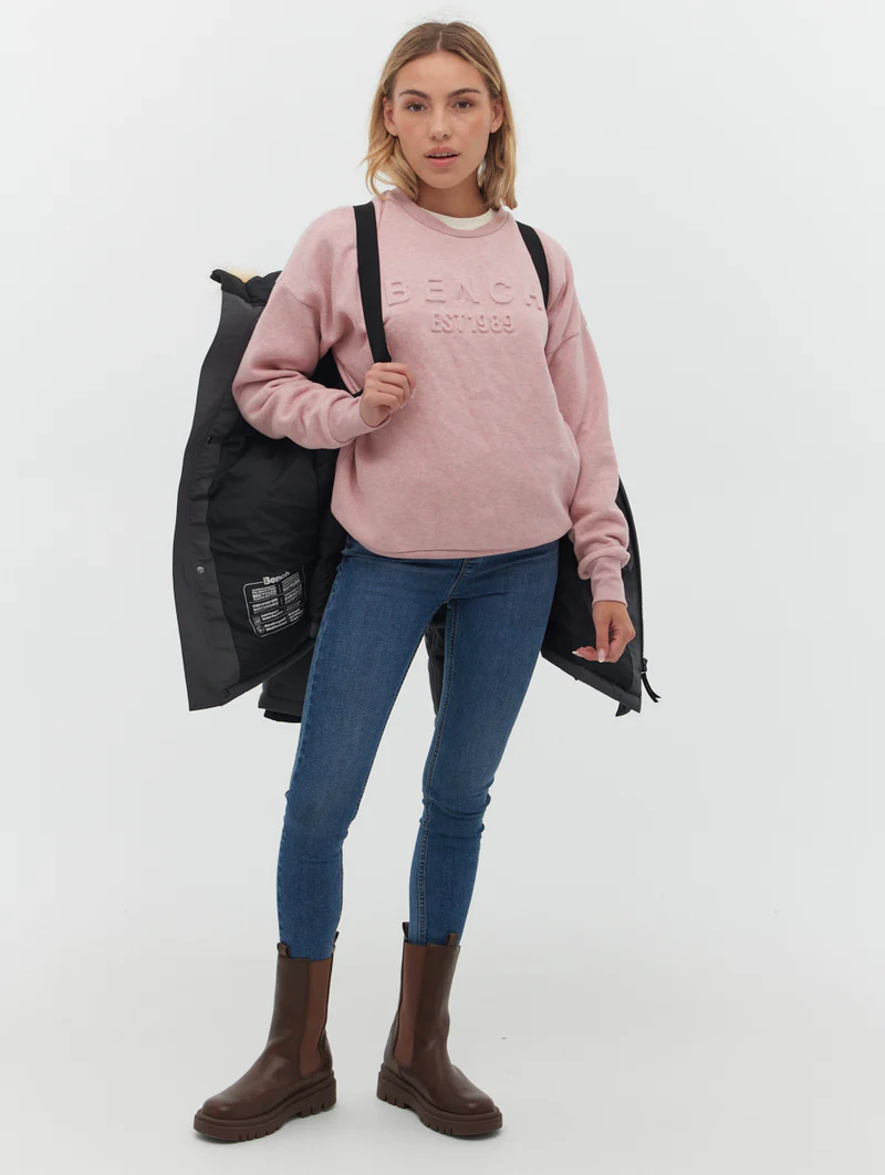 woman wearing bench jacket