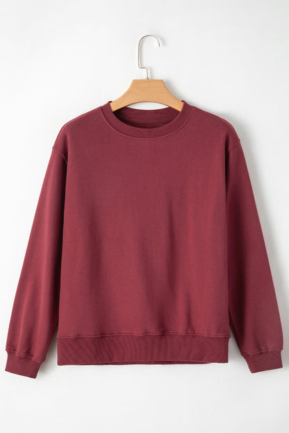 Burgundy drop shoulder sweatshirt on a hanger showcasing soft terry fabric and relaxed fit - Front View-v2