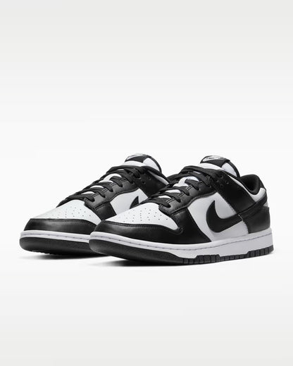 Black and white sneakers on a light gray background