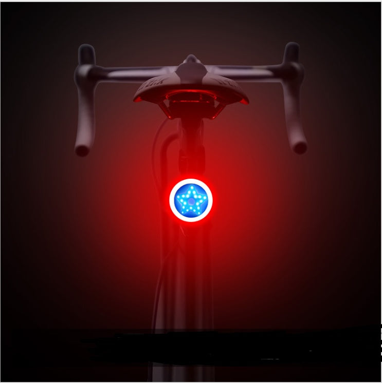 Rechargeable bicycle taillight with COB LED and USB charging, compact and lightweight design.