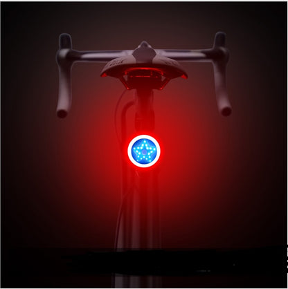 Rechargeable bicycle taillight with COB LED and USB charging, compact and lightweight design.