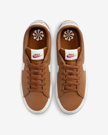 Nike Court Legacy Next Nature sneakers in Light British Tan with Fire Red and Sail accents. Top view.
