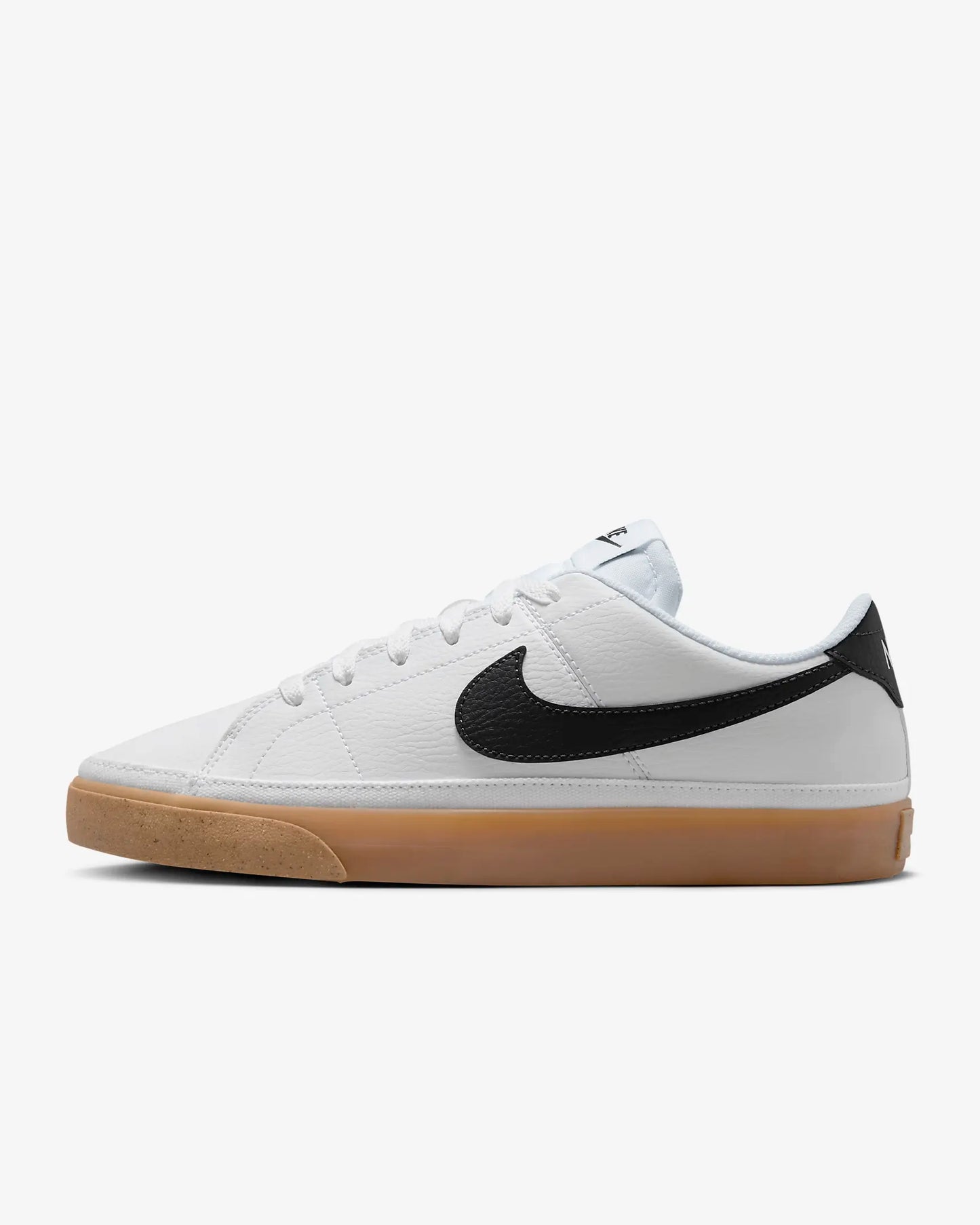 Nike Court Legacy Next Nature sneakers in white with gum yellow outsole and synthetic leather upper.