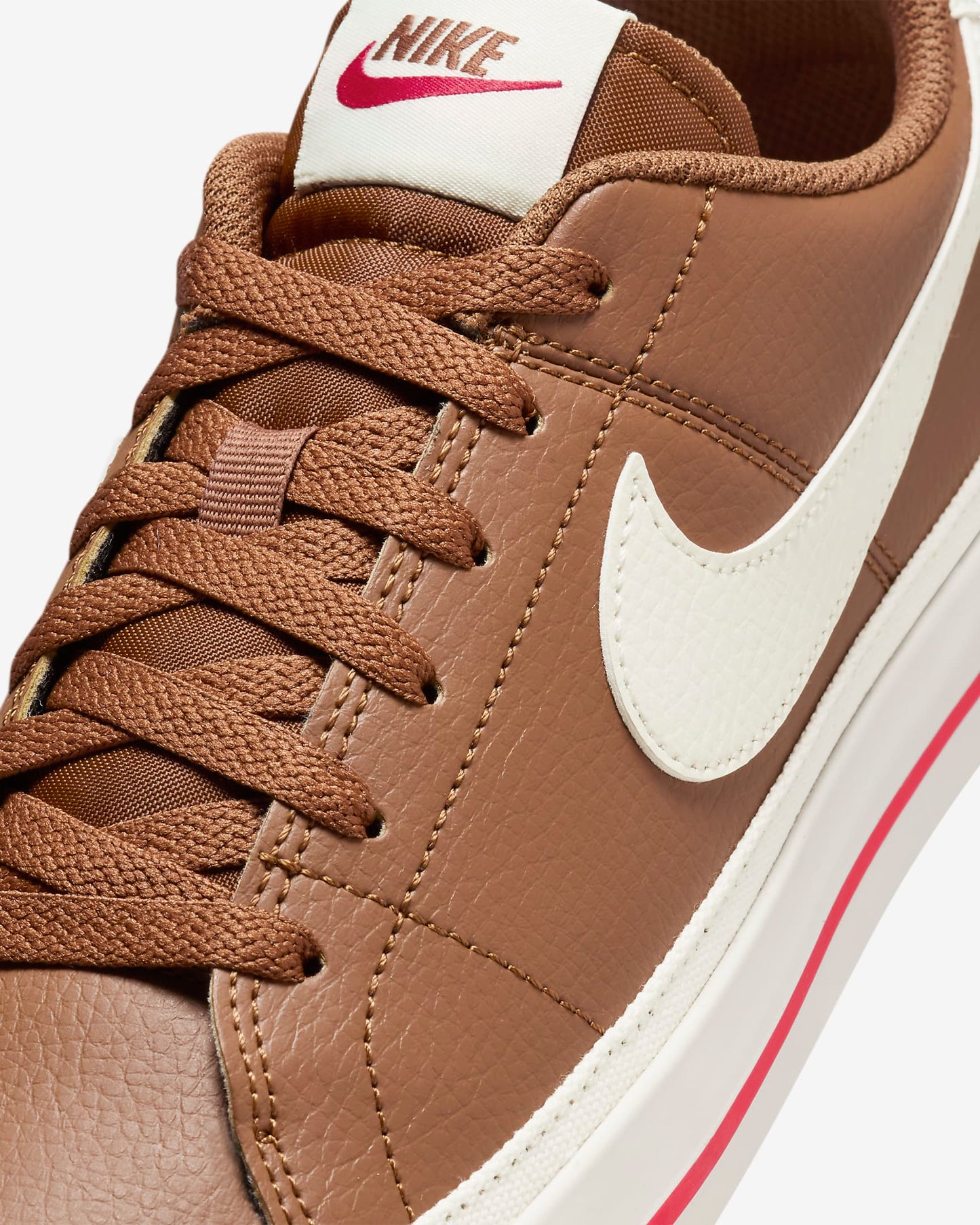 Nike Court Legacy Next Nature sneakers in Light British Tan with Fire Red and Sail accents.