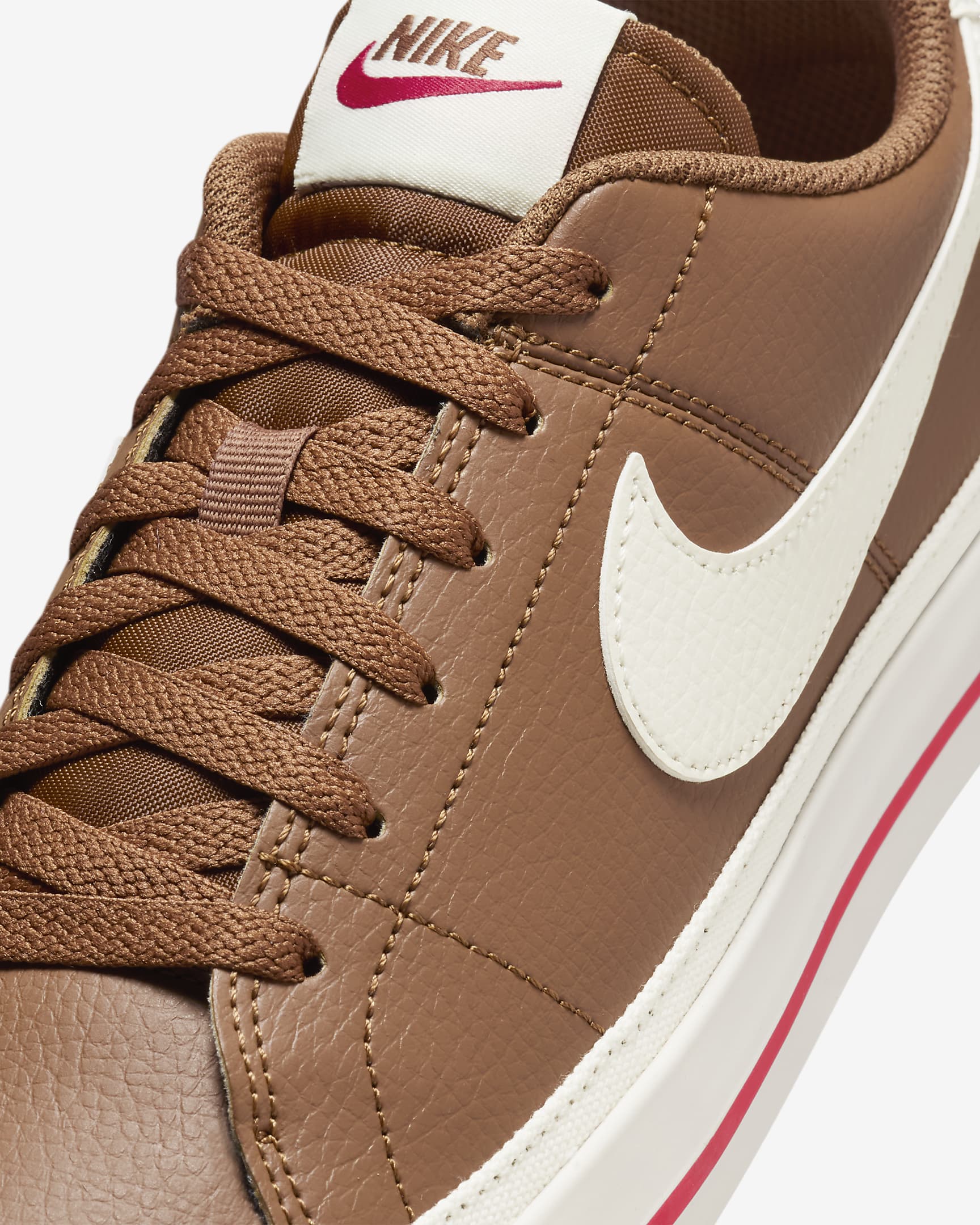 Nike Court Legacy Next Nature sneakers in Light British Tan with Fire Red and Sail accents.