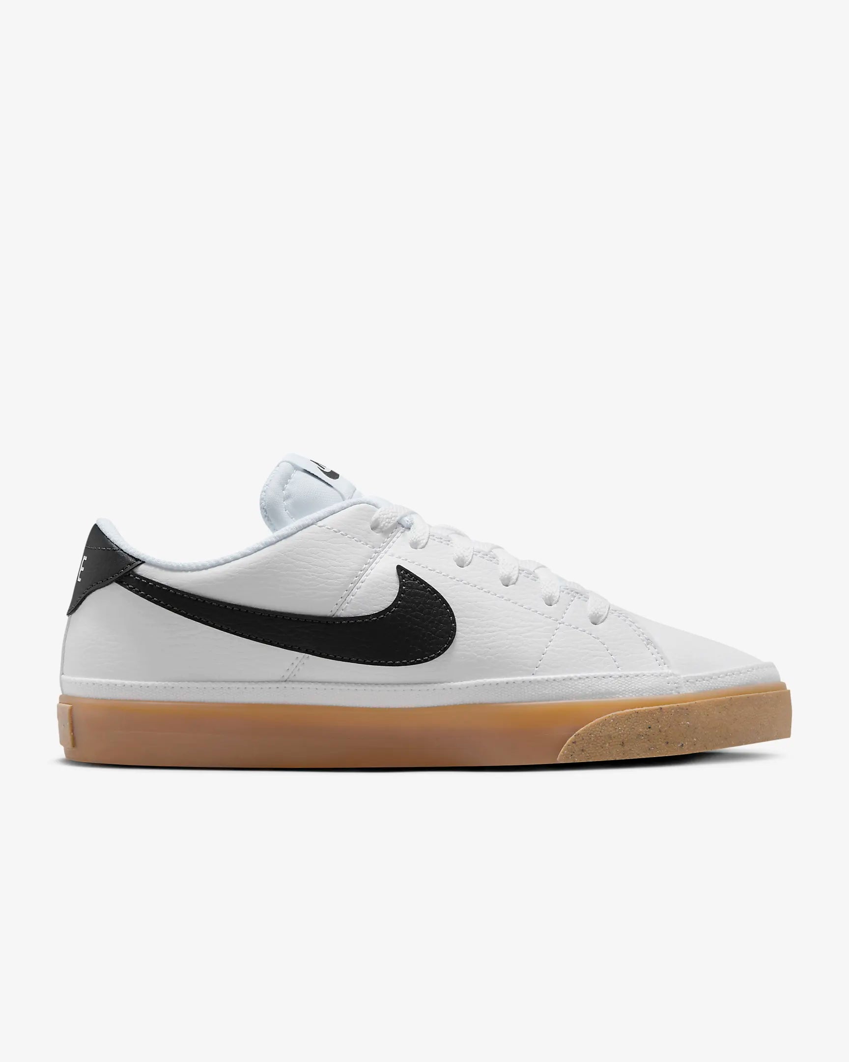 Nike Court Legacy Next Nature sneakers in white with gum yellow outsole and synthetic leather upper. Side view.