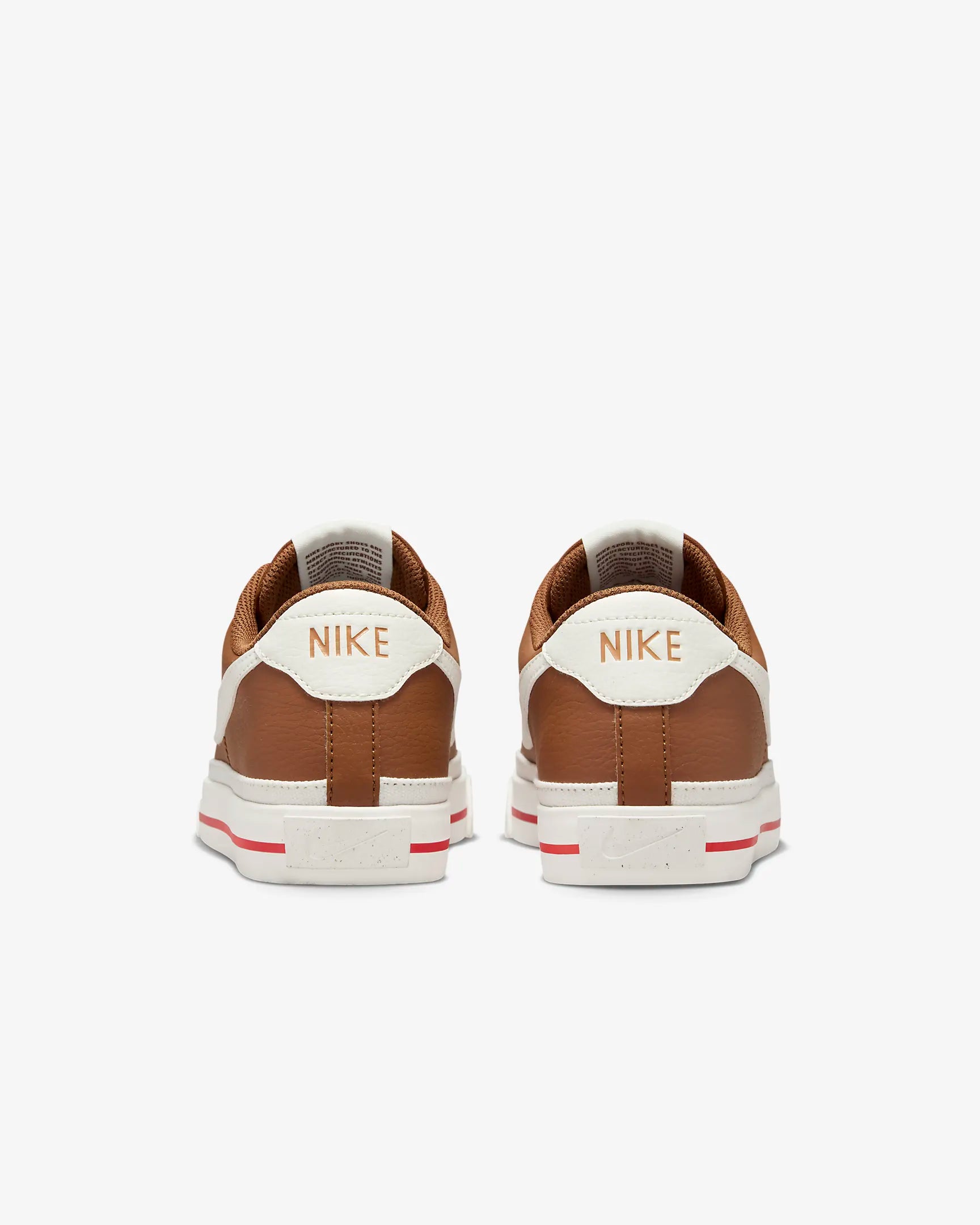Nike Court Legacy Next Nature sneakers in Light British Tan with Fire Red and Sail accents. Back view. 