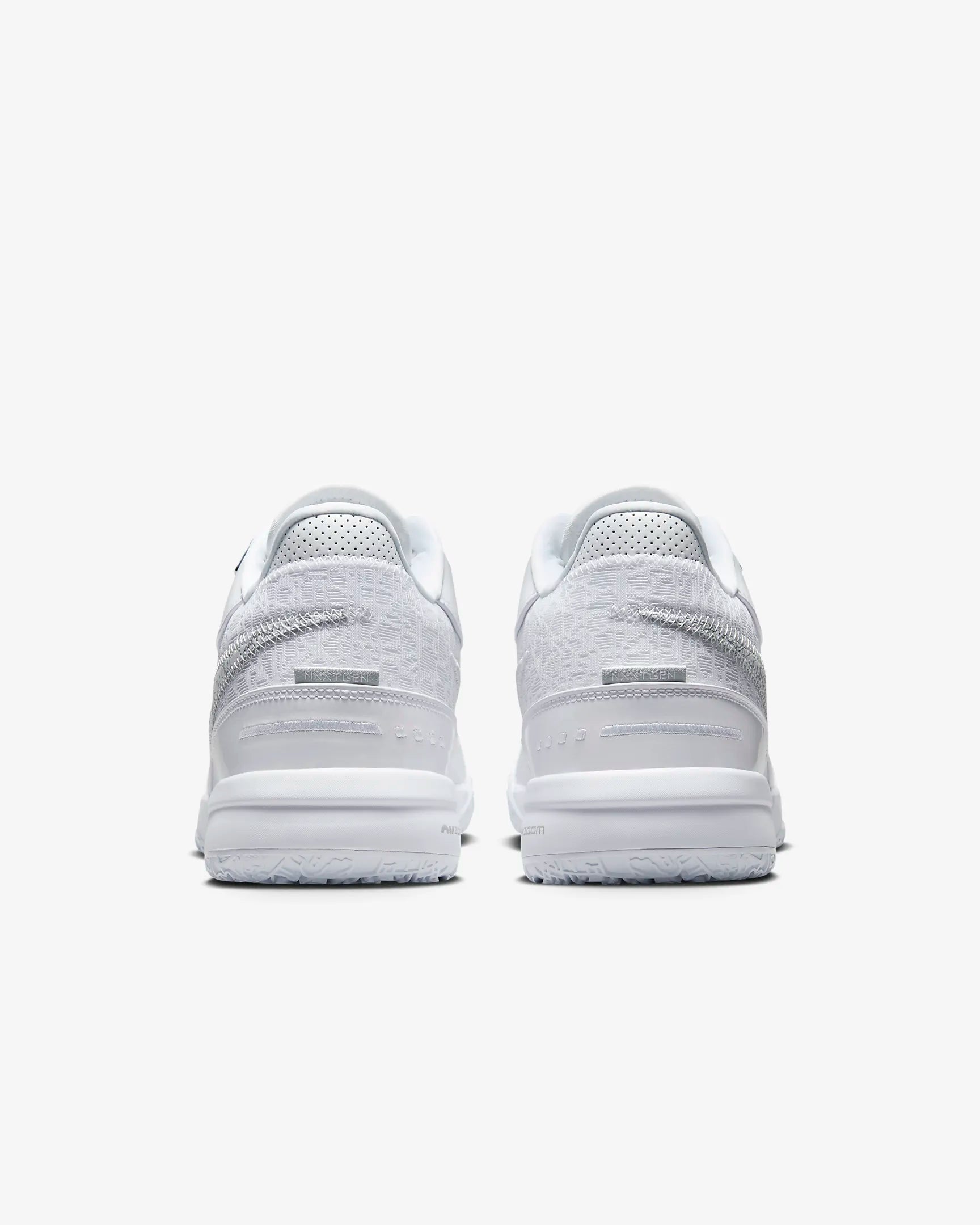 Side profile of LeBron NXXT Gen shoes with multidirectional traction inspired by Akron map. White color. Back view.