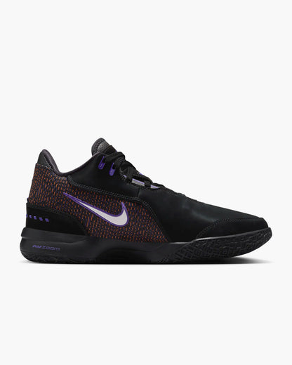 Side profile of LeBron NXXT Gen shoes with multidirectional traction inspired by Akron map. Black color. 