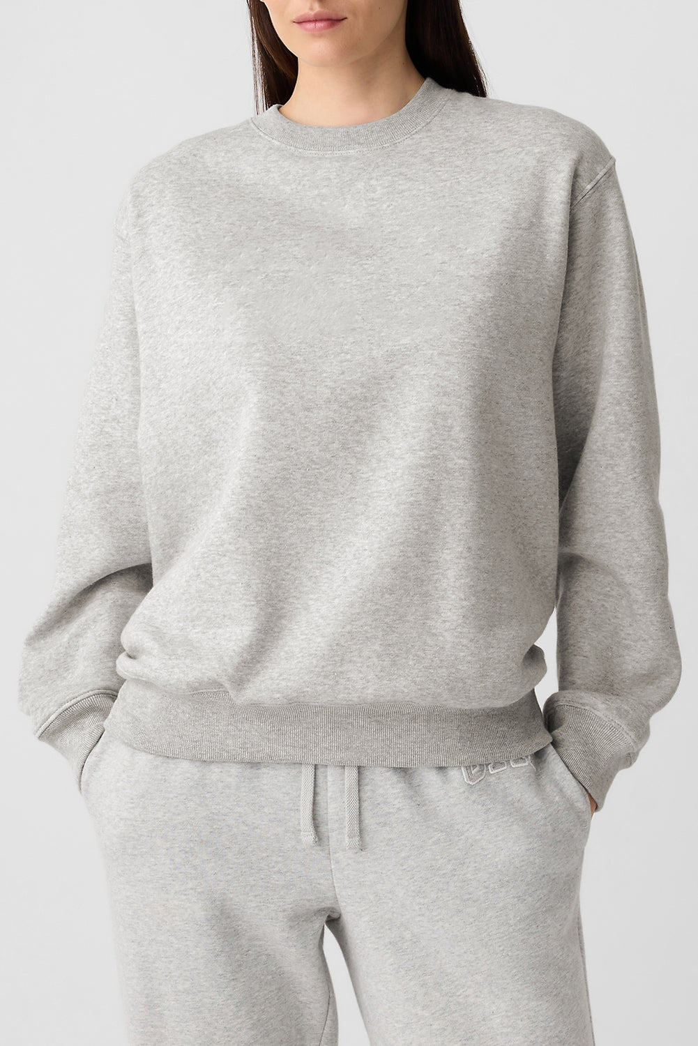gray drop shoulder sweatshirt on a hanger showcasing soft terry fabric and relaxed fit