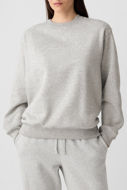 gray drop shoulder sweatshirt on a hanger showcasing soft terry fabric and relaxed fit